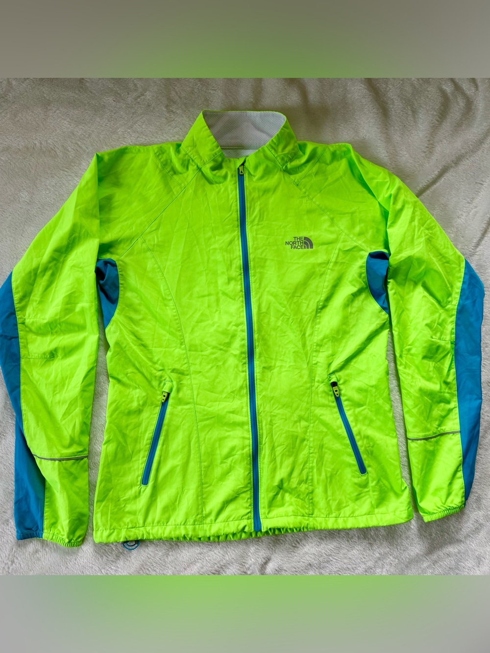 The North Face Women’s Reflective/Neon Torpedo Running Jacket